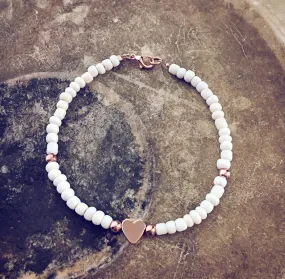 rose gold heart and off white bead bracelet